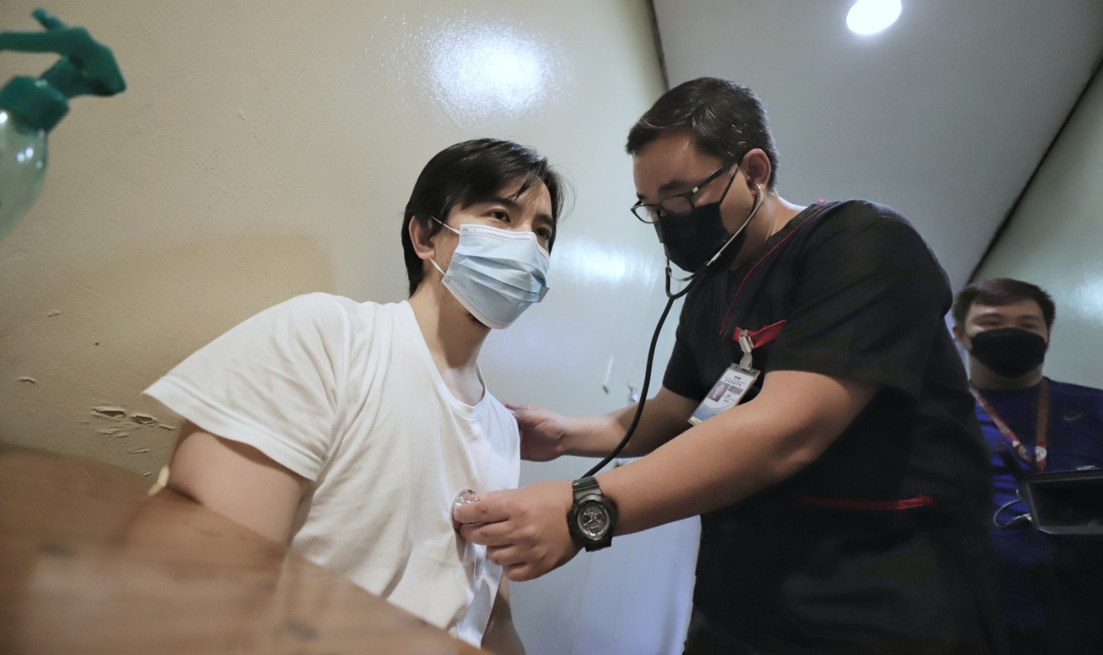 SENATE SENDS PHARMALLY EXECS TO PASAY JAIL: Pharmally Pharmaceutical Corporation executives Linconn Ong and Mohit Dargani undergo medical check-up, including an antigen test for COVID-19, in the Senate before they are transferred to the Pasay City Jail Monday, November 29, 2021. The Senate Blue Ribbon Committee ordered the transfer of the two Pharmally executives to the Pasay City Jail after they failed to provide the documents needed by the panel for its probe on the alleged anomalies in the purchase of personal protective equipment and other medical supplies related to the fight against COVID-19. In the commitment order signed Saturday, November 27, by Senate President Vicente Sotto III and Sen. Richard Gordon, Blue Ribbon Committee chairman, Ong and Dargani would remain in jail "until such time that they will properly answer questions propounded to them, submit documents required by the committee or otherwise purge themselves of a contempt order imposed against them." (Joseph Vidal/Senate PRIB)