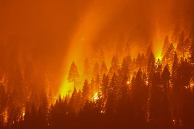 FILE PHOTO: The Dixie Fire ranked as the second-largest California wildfire on record - surpassed only by the million-acre-plus August Complex Fire of 2020.  REUTERS/David Swanson/File Photo