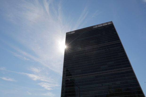 The sun shines behind the United Nations Secretariat Building at the United Nations Headquarters in New York City, June 18, 2021. REUTERS/Andrew Kelly/File Photo