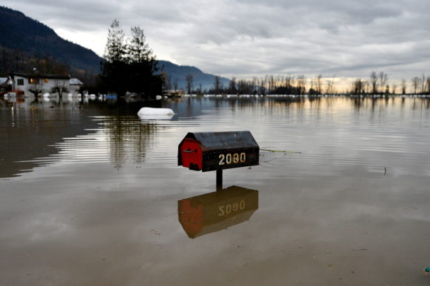 Flood water is seen a week after rainstorms lashed the western Canadian province of British Columbia, triggering landslides and floods, shutting highways, in Abbottsford, British Columbia, Canada November 22, 2021.  REUTERS/Jennifer Gauthier