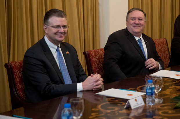 FILE PHOTO: U.S. Secretary of State Mike Pompeo and U.S. Ambassador to Vietnam Daniel Kritenbrink attend a meeting with Vietnamese Foreign Minister Pham Binh Minh at the Ministry of Foreign Affairs in Hanoi, Vietnam, February 26, 2019. Andrew Harnik/Pool via REUTERS