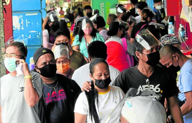 BUSY AGAIN People have been returning to San Pedro Street in Davao City since September, mindful of health protocols as restrictions are eased in the city. —BING GONZALES