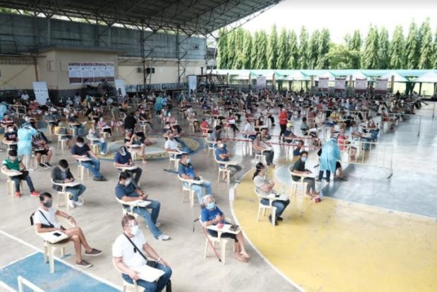 A COVID-19 mega vaccination facility at the Divine Word College of Laoag