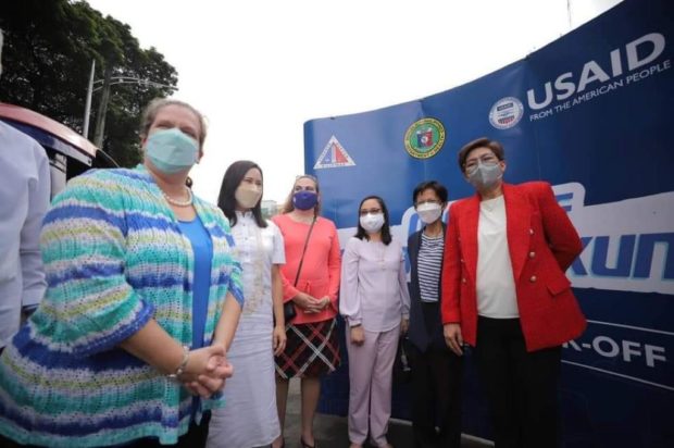 USAID, DILG cite Quezon City's pandemic response as new COVID cases dip