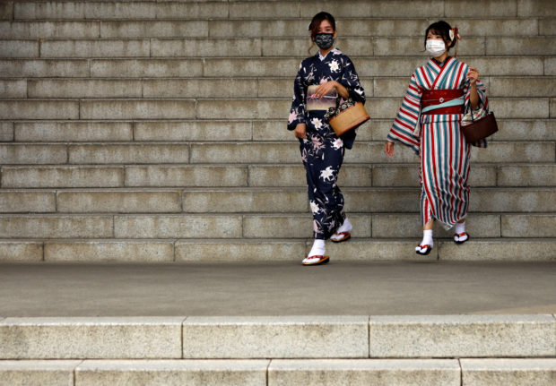 kimono-clad tourists in japan