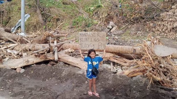LOOK: Children plead for help in Typhoon Odette-hit Southern Leyte