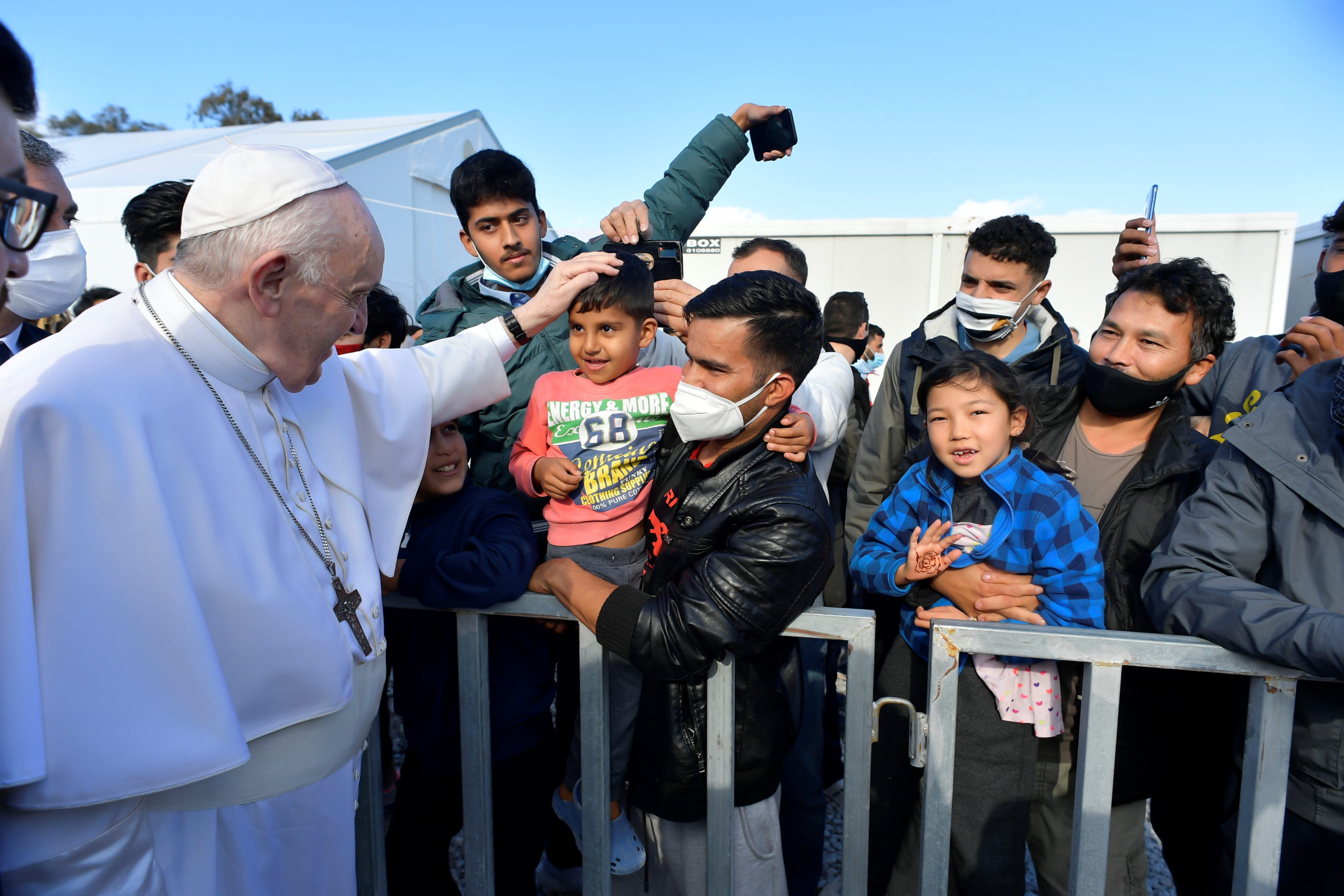 Pope Francis visits the island of Lesbos to meet with the the refugees and migrants at the Mavrovouni camp, Greece, December 5, 2021. Vatican Media/­Handout via REUTERS