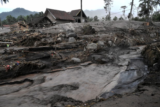 Indonesia volcano erupts again as death toll rises to 22