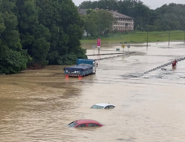 Cars submerged by floods in Shah Alam