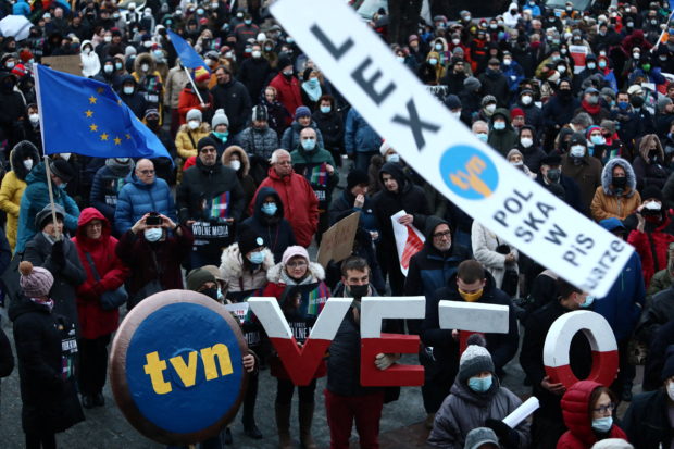 People take part in a rally to protest against a media bill passed by Poland's parliament, that critics say aims to affect the operations of news channel TVN24 owned by U.S. company Discovery Inc, in Krakow, Poland December 19, 2021. Jakub Porzycki/Agencja Wyborcza.pl via REUTERS