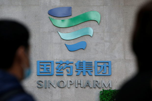 FILE PHOTO: A logo of Sinopharm is pictured during a government-organised visit to the production line of COVID-19 vaccine by Beijing Institute of Biological Products of Sinopharm's China National Biotec Group (CNBG), in Beijing, China February 26, 2021. REUTERS/Tingshu Wang