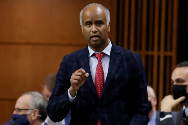 FILE PHOTO: Canada's Minister of Housing, Diversity, and Inclusion Ahmed Hussen speaks during Question Period in the House of Commons on Parliament Hill in Ottawa, Ontario, Canada November 30, 2021. REUTERS/Blair Gable/