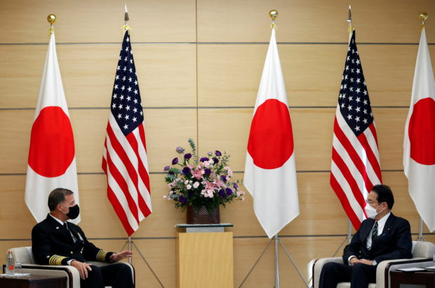 FILE PHOTO: Admiral John Aquilino, Commander of the United States Indo-Pacific Command, talks with Japan's Prime Minister Fumio Kishida during their meeting at Kishida's official residence in Tokyo, Japan November 11, 2021.  REUTERS/Issei Kato/Pool/File Photo