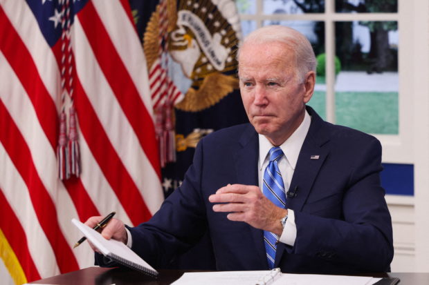 US President Joe Biden said Thursday that any entry of Russian troops into Ukraine will be treated by the West as "an invasion," as he tried to clarify confusion over an earlier suggestion that a "minor" attack could invite a lesser response.