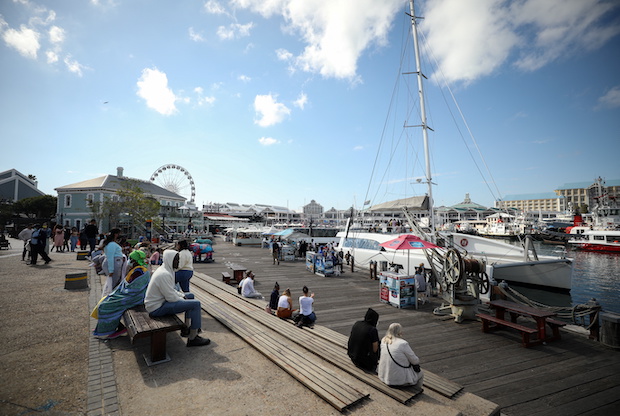 Visitors are seen at the popular Waterfront district, as numbers of international tourists decline in Cape Town