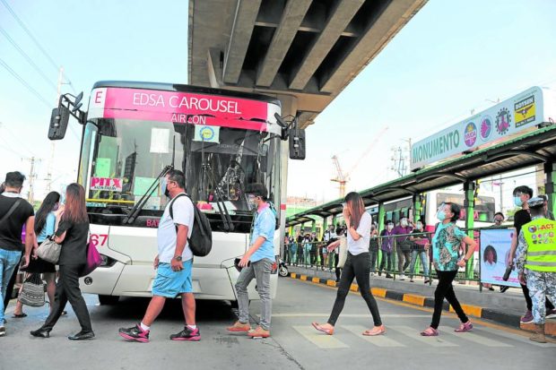 FREE RIDE NO MORE / JUNE 30, 2021 Passengers queue to ride the EDSA Bus Carousel in Monumento, Caloocan City on Wednesday, June 30, 2021. Passengers are calling on the government to extend the Libreng Sakay Program as the Bayanihan As One Act end its effectiveness on June 30, prompting the DOTr and LTFRB to suspend its Service Contracting and Free Ride Program starting July 1. INQUIRER PHOTO / GRIG C. MONTEGRANDE