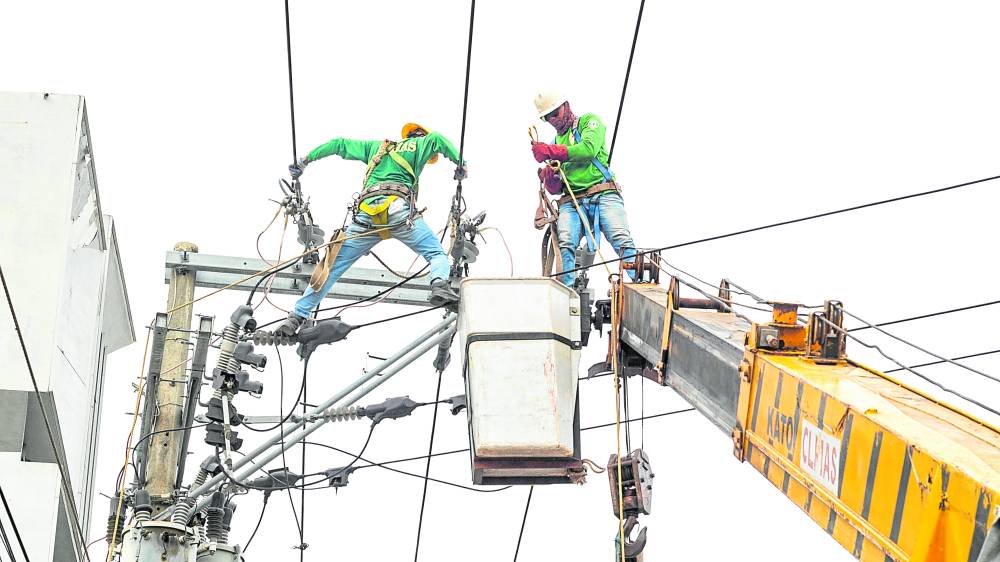 Linemen of Visayan Electric Co. work 24/7 to be able to restore power in Metro Cebu which lost its electricity supply following the onslaught of Typhoon “Odette”