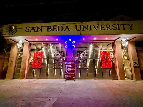 LOOK: San Beda University lights up in pink for Robredo | Inquirer News