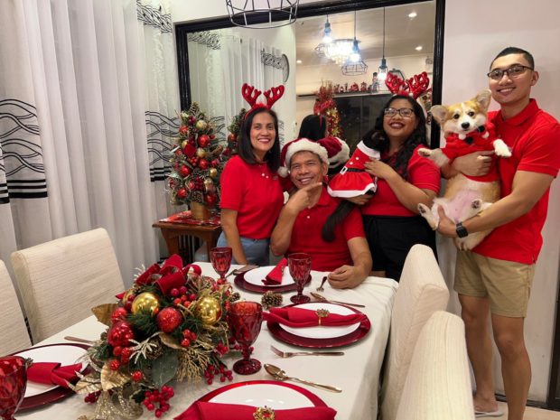 A picture of Ka Leody De Guzman with his family on Christmas eve with his supposed lavish dinner setup and expensive dog drew the attention of bashers. Image from Twitter / Ka Leody de Guzman