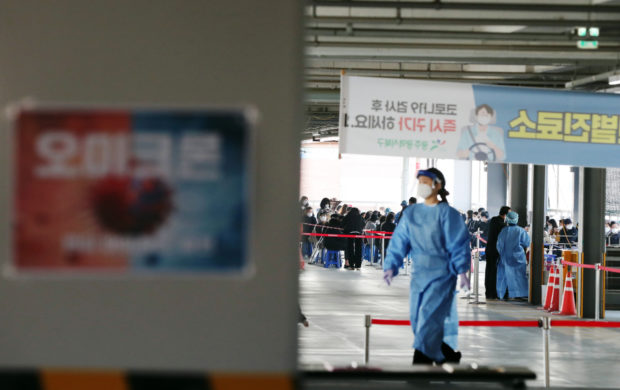 People line up to take a COVID-19 test at a testing center in Gwangju, South Korea