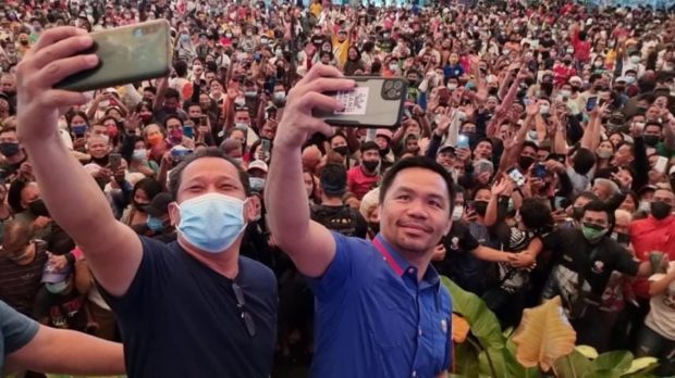 Pacquiao bucks banning campaign motorcade despite rising fuel costs