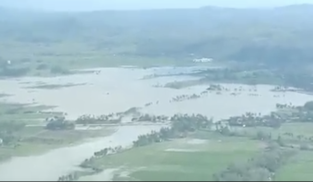 An aerial footage taken by the Philippine Coast Guard (PCG) Aviation Force showed most areas in Kabankalan City in Ilog, Negros Occidental still swollen with floodwaters following the onslaught of Typhoon Odette. Image from Facebook ? Phil. Coast Guard