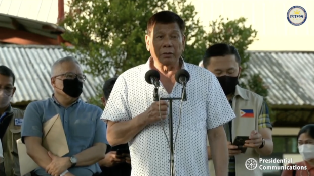 President Rodrigo Duterte speaks to the crowd in Puerto Princesa, Palawan. Screenshot from PCOO / Facebook