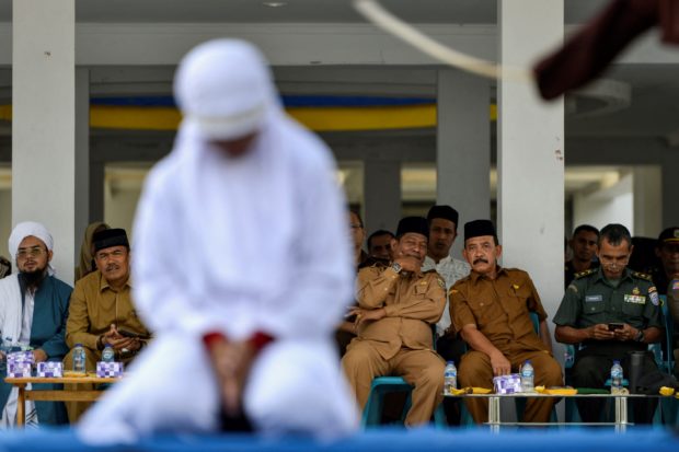 Indonesian woman flogged 100 times for adultery, partner gets 15