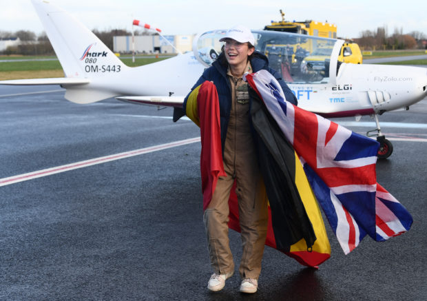 Beaming and waving her arms in the air, teenage pilot Zara Rutherford was euphoric Thursday after completing a solo, round-the-world flying odyssey with the dream of getting into the record books.
