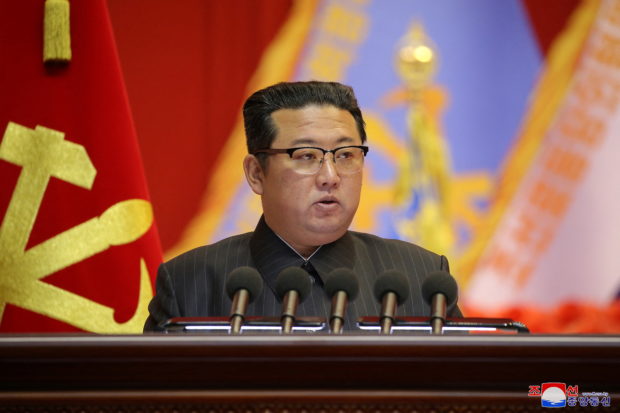  North Korean leader Kim Jong Un speaks during the Eighth Conference of Military Educationists of the Korean People's Army at the April 25 House of Culture in Pyongyang, North Korea in this undated photo released on December 7, 2021. KCNA via REUTE