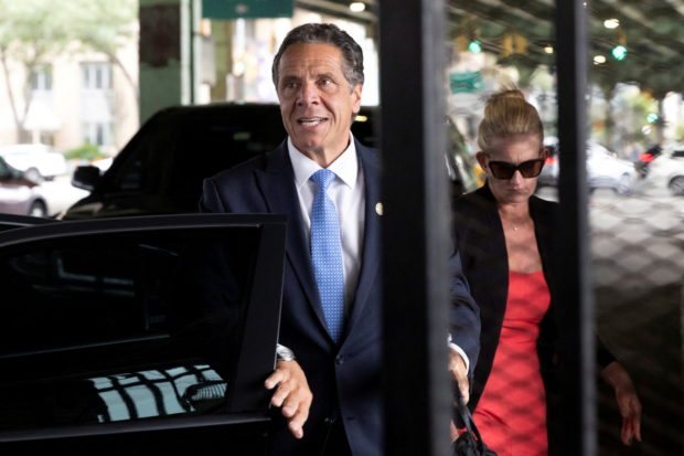 FILE PHOTO: New York Governor Andrew Cuomo arrives to depart in his helicopter after announcing his resignation in Manhattan, New York City, U.S., August 10, 2021. REUTERS/Caitlin Ochs/File Photo