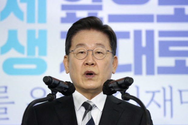 Lee Jae-myung, the presidential candidate of the ruling Democratic Party, speaks during a New Year press conference at the Kia Motors plant in Gyeonggi-Do, South Korea January 04, 2022. Chung Sung-Jun/Pool via REUTERS