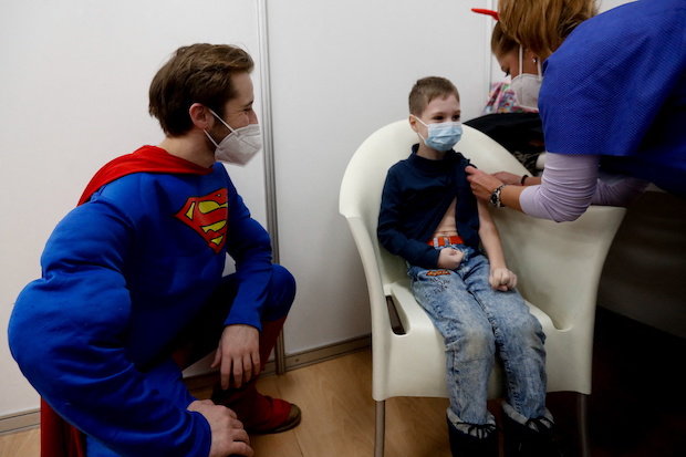 Children get vaccinated against COVID-19 in Prague