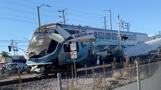 Plane hit by train after crashing on train tracks in California