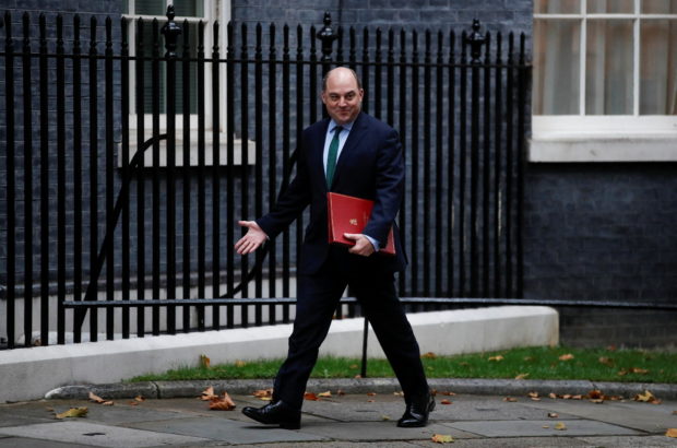FILE PHOTO: Britain's Defence Secretary Ben Wallace walks outside Downing Street in London, Britain, October 27, 2021. REUTERS/Peter Nicholls