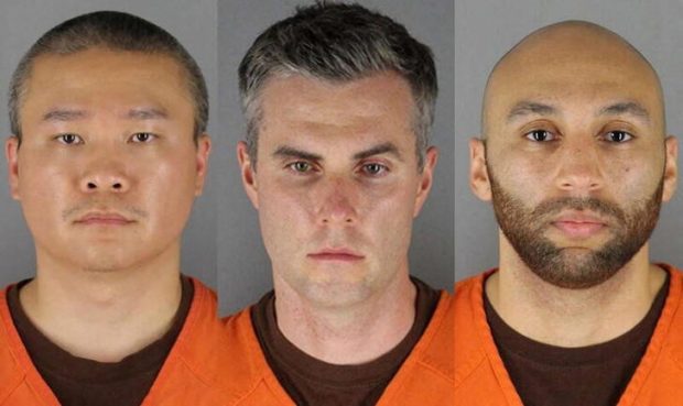FILE PHOTO: (L-R) Former Minneapolis police officers Tou Thao, Thomas Lane and J. Alexander Kueng in a combination of booking photographs from the Minnesota Department of Corrections and Hennepin County Jail in Minneapolis, Minnesota.  U.S. Minnesota Department of Corrections and Hennepin County Sheriff's Office/Handout via REUTERS