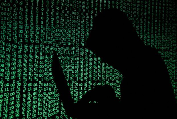 Hacker silhouette image. STORY: 3 more news sites under cyberattack – NUJP