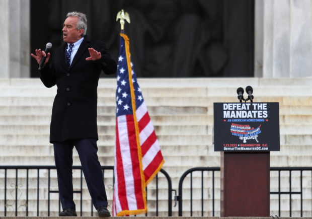 FILE PHOTO: Robert F. Kennedy Jr. speaks during a rally following a march in opposition to coronavirus disease (COVID-19) mandates on the National Mall, in Washington, D.C., U.S., January 23, 2022. REUTERS/Tom Brenner