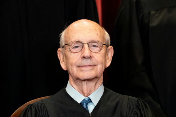 FILE PHOTO: Associate Justice Stephen Breyer poses during a group photo of the Justices at the Supreme Court in Washington, U.S., April 23, 2021. Erin Schaff/Pool via REUTERS/File Photo