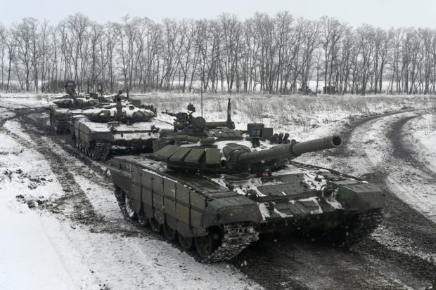 Russian T-72B3 main battle tanks drive during drills held by the armed forces of the Southern Military District at the Kadamovsky range in the Rostov region, Russia January 27, 2022. REUTERS/Sergey Pivovar