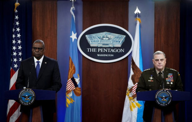 U.S. Defense Secretary Lloyd Austin and General Mark Milley, Chairman of the U.S. Joint Chiefs of Staff, faces reporters asking questions about Russia and the crisis in the Ukraine during a news conference at the Pentagon in Washington, U.S., January 28, 2022. REUTERS/Joshua Roberts