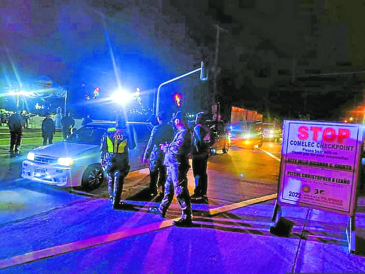A police checkpoint is put up in front of the Bulacan provincial capitol along MacArthur Highway in Malolos City to enforce the May 2022 election gun ban that is in effect until June 8, 2022.