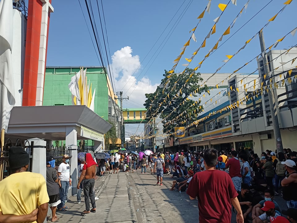 Olongapo City residents flock to Columban College to get vaccinated against COVID-19 as the city government and local establishments began banning unvaccinated individuals