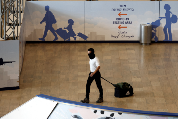 Israelis rushed to get tested for COVID-19 on Monday (January 3), with long queues of vehicles and pedestrians seen across the country as Omicron variant infections rise.
