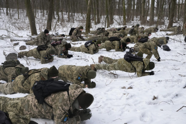 Ukrainian forces and volunteer soldiers