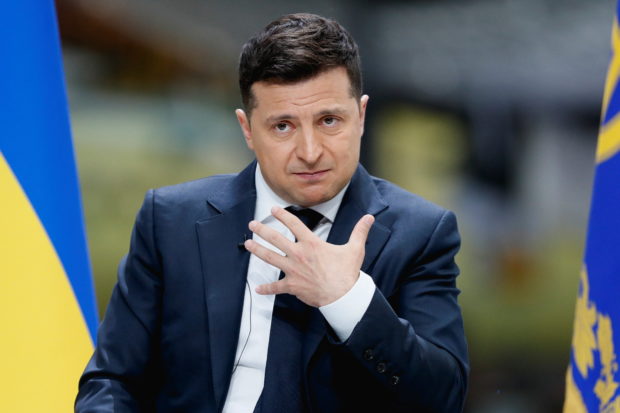 President Volodymyr Zelensky on Friday called on Western leaders to avoid stirring "panic" as Ukraine faces a Russian troop buildup on the border that has sparked fears of an invasion.