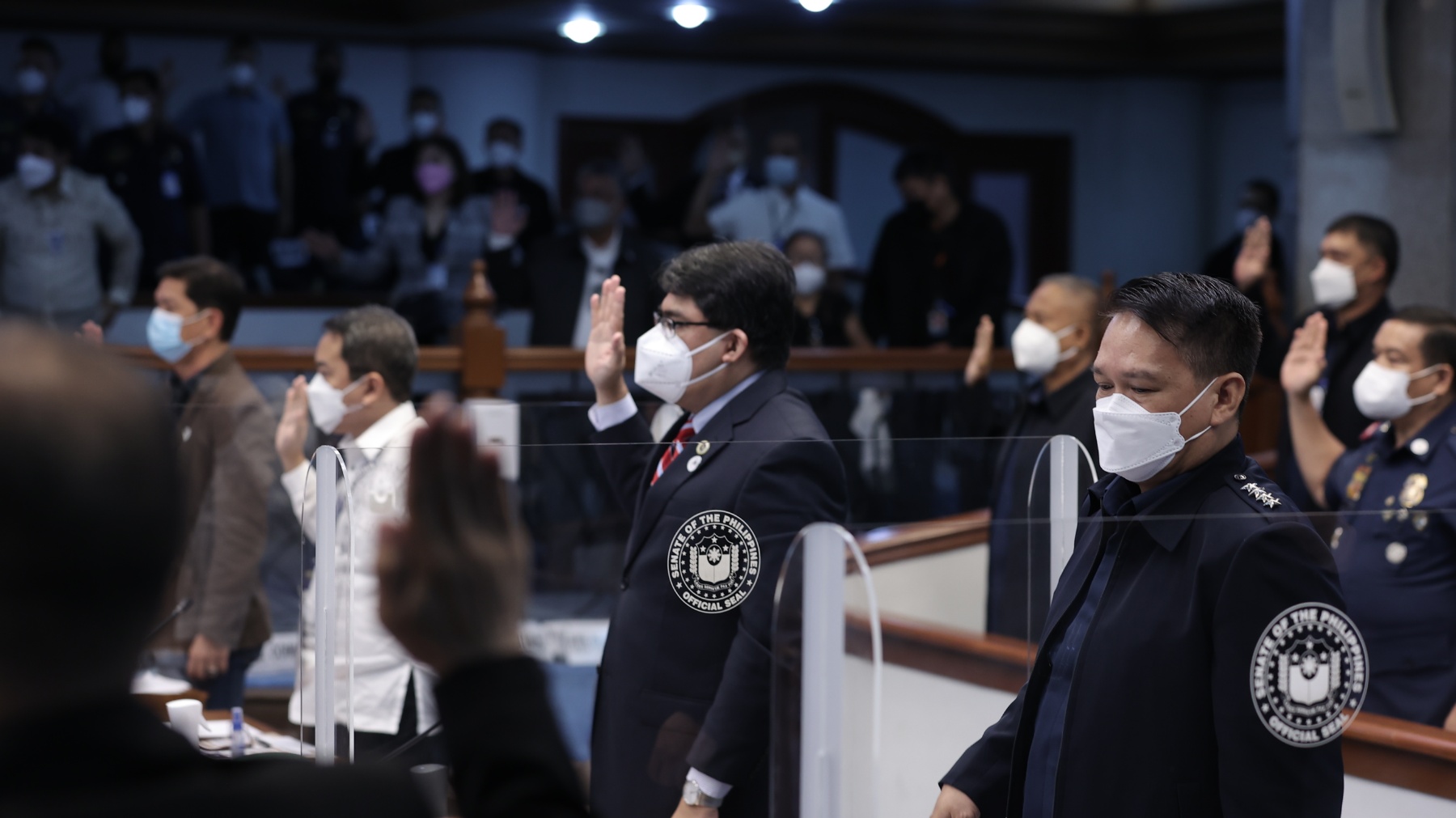 (From right) Philippine National Police chief Dionardo Carlos, Chief State Counsel George Ortha II and other resource persons take their oath before the Senate public order and dangerous drugs committee begins its probe on the rising number of missing persons allegedly involved in cockfighting. 
