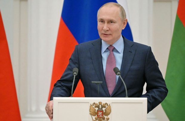 Russia's President Vladimir Putin speaks during a press conference with his Belarus counterpart, following their talks at the Kremlin in Moscow on February 18, 2022. - Vladimir Putin said on February 18, 2022 that the situation in conflict-hit eastern Ukraine was worsening, as the West accuses him of planning an imminent attack on the country. (Photo by Sergei GUNEYEV / Sputnik / AFP)