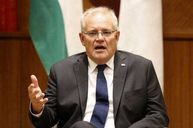 Australian Prime Minister Scott Morrison speaks at the top of a meeting of Australian, US, India and Japan foreign ministers at the Melbourne Commonwealth Parliament Offices in Melbourne on February 11, 2022. -  (Photo by Darrian Traynor / POOL / AFP)