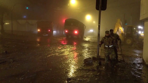 Heavy rainfall triggers a landslide in Quito.